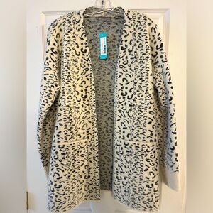 Brand New with tags Cardigan
Evolution by Cyrus